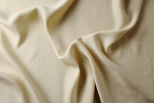 Cream-colored fabric with soft folds